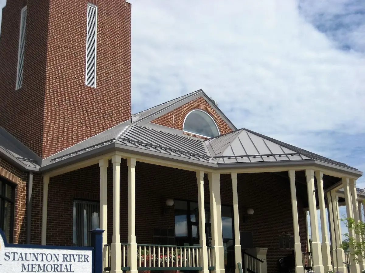 Skilled roofing craftsmen working on a residential roof in Mount Tirzah